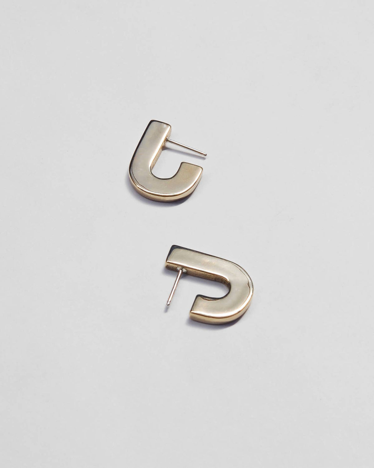 Juxta J Earrings : Brass