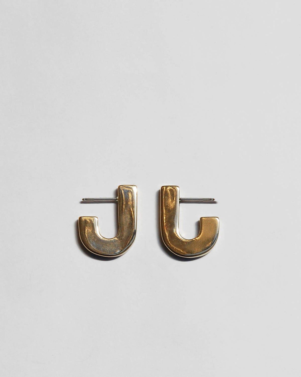 Juxta J Earrings : Brass